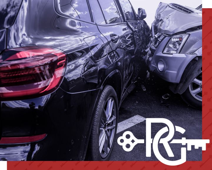 Two cars collide in a parking lot accident, causing significant damage.