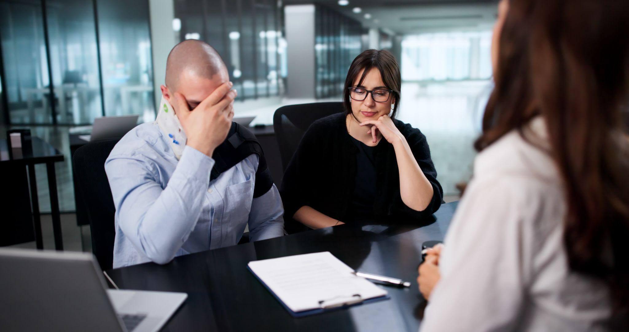 Group of people seated around a table